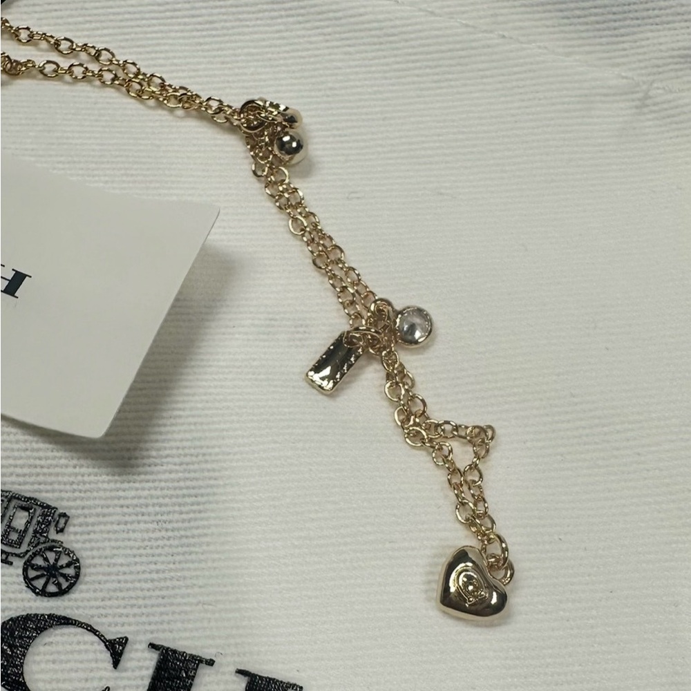 Coach Yellow Gold Plated Charm Bracelet Includes Dust Bag NWT 6.5” MSRP $125 - Picture 4 of 8